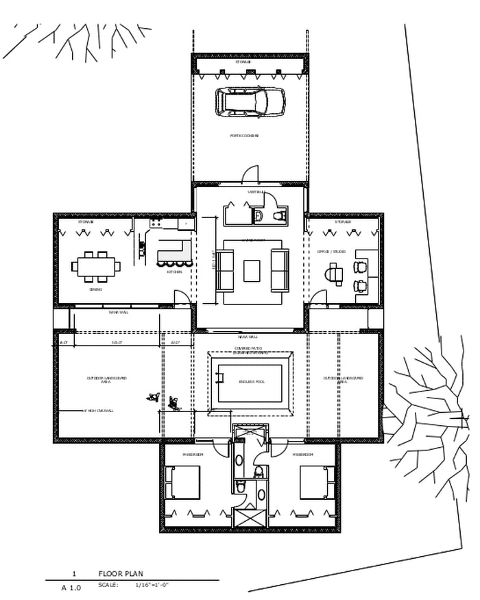 A black-and-white architectural floor plan showing a house layout with labeled rooms, furniture icons, a garage, and a driveway, with a small title block at the bottom.