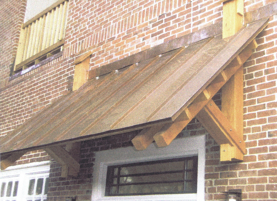 Detail of the restored timber entrance canopy preserving the historic craftsmanship of the original church.