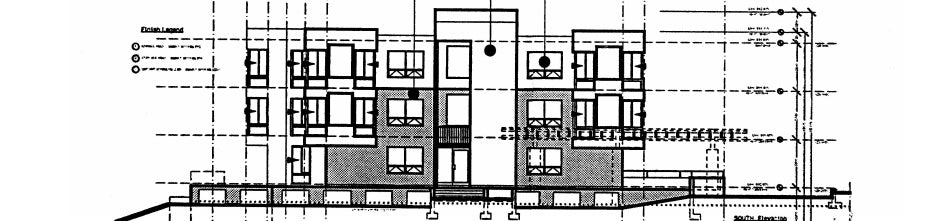 South building elevation illustrating the four-story massing and architectural composition.