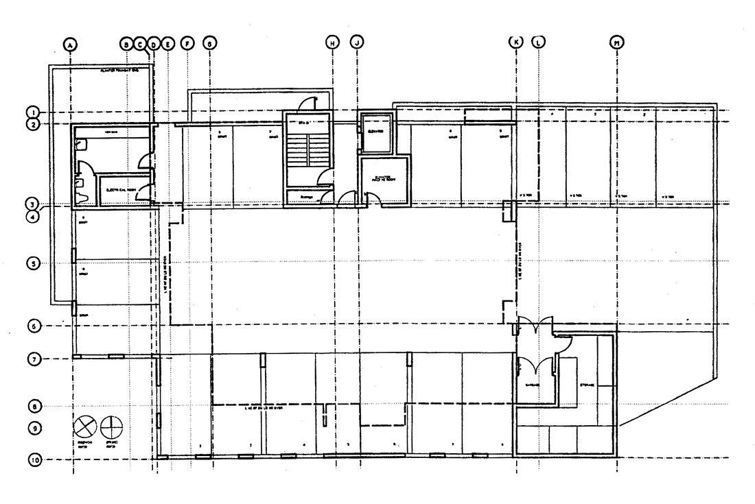 Ground floor plan showing residential entrances, common areas, service spaces, and building organization.